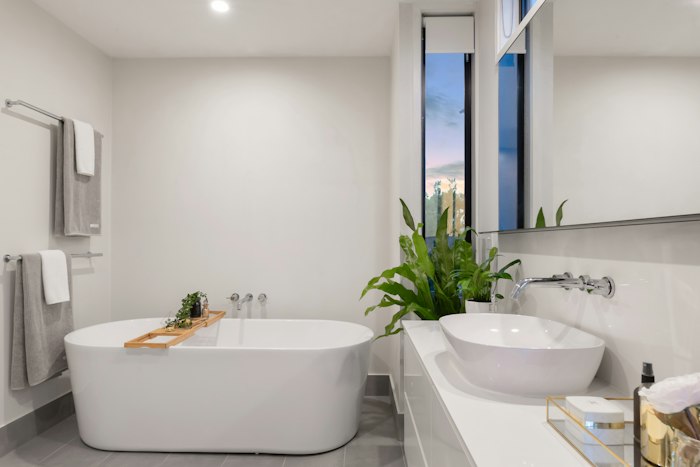Modern bathroom painted in trendy tile paint